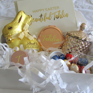 styled easter bunny gift box with easter eggs and rose gold candle and card